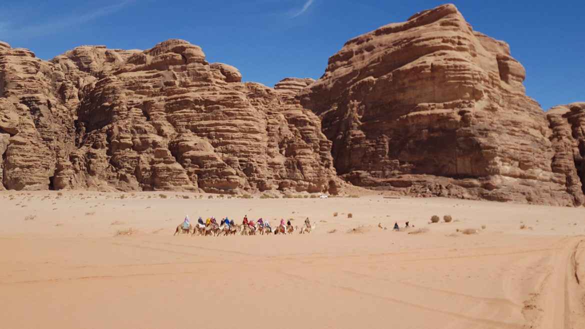 A caravan traversing across Wadi Rum in Jordan.